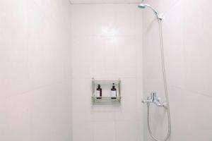 Cozy and Restful Studio LRT City Sentul - Royal Sentul Park Apartment By Travelio