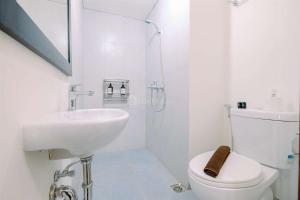 Cozy and Restful Studio LRT City Sentul - Royal Sentul Park Apartment By Travelio