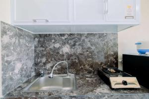 Cozy and Restful Studio LRT City Sentul - Royal Sentul Park Apartment By Travelio