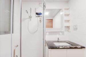 Spacious and Cozy 3BR Sky House BSD Apartment By Travelio