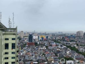 Best Homey Elegant Studio Room at Amethyst Apartment By Travelio