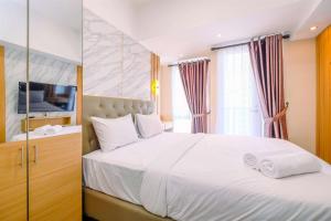 Warm and Cozy Studio at Tokyo Riverside PIK 2 Apartment By Travelio