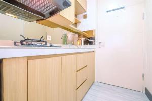 Warm and Cozy Studio at Tokyo Riverside PIK 2 Apartment By Travelio