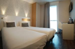Hotels Brit Hotel Les Alizes : photos des chambres