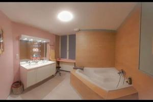 Appartements Suite Jeux Coquins La Curieuse : photos des chambres