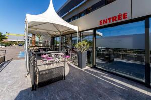 Hotels Brit Hotel Porte d'Espagne : photos des chambres