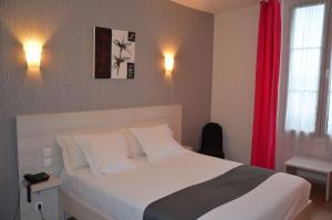 Hotels Brit Hotel Du Dauphin L'Aigle : photos des chambres