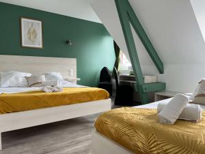Hotels Brit Hotel Du Dauphin L'Aigle : photos des chambres