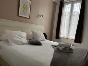 Hotels Brit Hotel Du Dauphin L'Aigle : photos des chambres