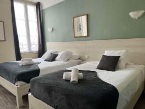 Hotels Brit Hotel Du Dauphin L'Aigle : photos des chambres