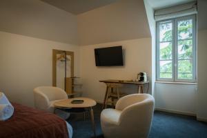 Hotels Domaine de l-Ecorcerie : photos des chambres