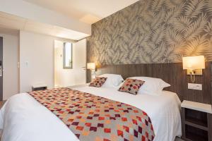 Hotels Brit Hotel Ploermel - Hotel de l'Hippodrome : photos des chambres