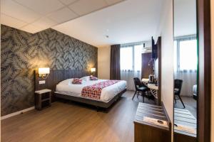 Hotels Brit Hotel Ploermel - Hotel de l'Hippodrome : photos des chambres