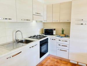 Flat with patio overlooking the pool