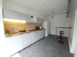 Appartements Troglodyte Baths : photos des chambres