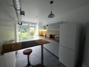 Appartements Troglodyte Baths : photos des chambres