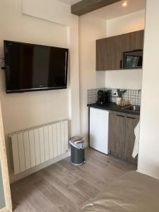 Appartements Beau studio neuf et equipe : photos des chambres