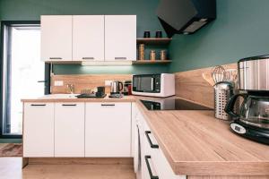 Appartements Bel appartement neuf et paisible : photos des chambres