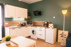 Appartements Bel appartement neuf et paisible : photos des chambres