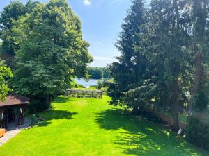 POGO dom nad Narwią - 4 sypialnie, duża sauna, balia, pomost, plac zabaw