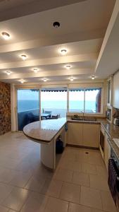 Con Vista al Mar y Terraza Privada, Céntrico