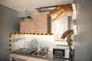 Appartements Jurassique Appart : photos des chambres