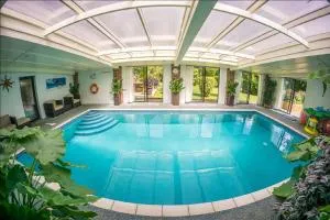 Ferien-Cottage mit Grillplatz im privaten Wintergarten - Fairlight