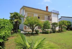 Ferienwohnung Tino mit Garten in Strandnähe 