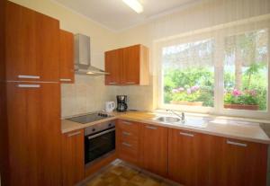 Ferienwohnung Tino mit Garten in Strandnähe 