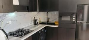 Luxe flat met privé strand en zwembaden