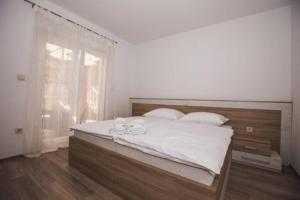 Geräumige Wohnung in Lopar mit Terrasse, Grill und Garten 