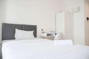 Nice and Cozy Studio Sky House BSD Apartment By Travelio