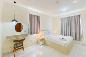 Relaxing Studio (Free IPL & Utilities) Grand Palace Kemayoran Apartment By Travelio