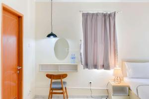 Relaxing Studio (Free IPL & Utilities) Grand Palace Kemayoran Apartment By Travelio