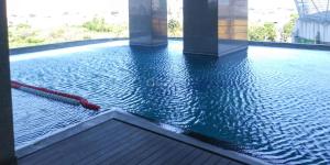 Nice and Comfortable Living 1BR at Grand Sungkono Lagoon Apartment By Travelio