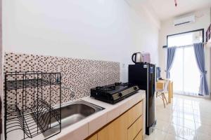 Comfort Studio Room at Dave Apartment By Travelio