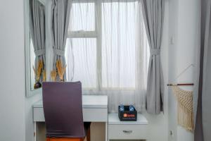 Simple and Cozy Living Studio Apartment at Margonda Residence 3 By Travelio