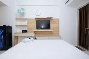 Modern and Homey Studio at Gunung Putri Apartment By Travelio - Parungdengdek