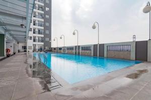 Cozy 2BR at Mekarwangi Square Cibaduyut Apartment By Travelio