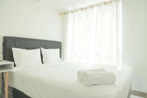 Restful and Comfy 2BR Tokyo Riverside PIK 2 Apartment By Travelio