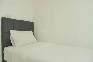 Restful and Comfy 2BR Tokyo Riverside PIK 2 Apartment By Travelio