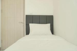 Restful and Comfy 2BR Tokyo Riverside PIK 2 Apartment By Travelio