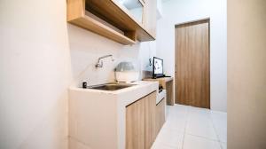 Simple and Comfortable Living 1BR at The City Square Apartment By Travelio
