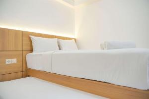 Good Choice and Minimalist 1BR Bassura City Apartment By Travelio