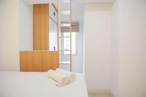 Good Choice and Minimalist 1BR Bassura City Apartment By Travelio