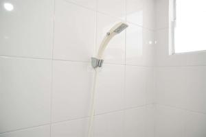 Good Choice and Minimalist 1BR Bassura City Apartment By Travelio