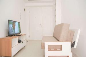 Good Choice and Minimalist 1BR Bassura City Apartment By Travelio
