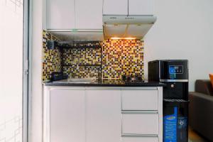 Great Deal and Nice 2BR Bassura City Apartment near Mall By Travelio