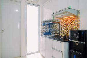 Great Deal and Nice 2BR Bassura City Apartment near Mall By Travelio