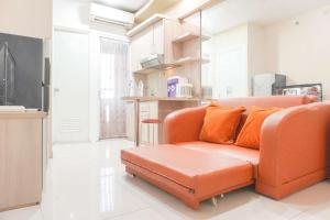 Good Deal and Relaxing 2BR Green Pramuka City Apartment By Travelio